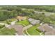 Aerial view of a home with a large lot and mature trees in a quiet neighborhood at 4865 Gorham Ave, Orlando, FL 32817