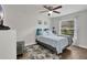 Bright bedroom with a ceiling fan, a soft area rug, and lots of light from a window at 4865 Gorham Ave, Orlando, FL 32817