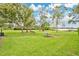 Green community park area featuring picnic tables and mature shade trees at 4865 Gorham Ave, Orlando, FL 32817