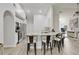 Stylish kitchen with breakfast bar, stainless steel appliances, and open layout that flows into the dining and living areas at 4865 Gorham Ave, Orlando, FL 32817
