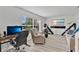 Dedicated office space with large window offering scenic views, a comfortable seating area, and ample room for work or relaxation at 4865 Gorham Ave, Orlando, FL 32817