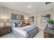 Stylish bedroom with contemporary decor, accent wall, and plush bedding at 5162 Masser Rd, St Cloud, FL 34772