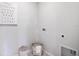 Functional laundry area with washer and dryer hookups and storage space at 5162 Masser Rd, St Cloud, FL 34772