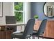 Well-lit office area with modern desk and comfortable seating, designed for both functionality and aesthetic appeal at 5162 Masser Rd, St Cloud, FL 34772