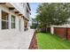 Charming backyard with a lovely fountain feature and a brick privacy wall at 617 Canopy Estates Dr, Winter Garden, FL 34787