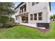 Spacious backyard with a patio area, perfect for entertaining, and lush landscaping at 617 Canopy Estates Dr, Winter Garden, FL 34787