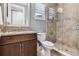 Modern bathroom featuring granite countertops, a glass shower, and updated fixtures at 617 Canopy Estates Dr, Winter Garden, FL 34787