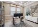 Cozy home office with modern desk, dual monitors, and decorative accents at 617 Canopy Estates Dr, Winter Garden, FL 34787