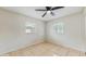 This bedroom includes two windows that allow natural light to fill the space at 624 American Heritage Pkwy, Orlando, FL 32809