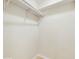 The image shows the interior of a closet featuring a shelf and rod for hanging clothes at 624 American Heritage Pkwy, Orlando, FL 32809