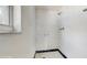 This is a tiled shower stall with standard fixtures, including a showerhead and faucet controls at 624 American Heritage Pkwy, Orlando, FL 32809