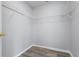 Empty closet with wood-look flooring and wire rack shelving at 631 Lady Diana Dr, Davenport, FL 33837