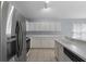 Updated kitchen featuring stainless steel refrigerator and appliances with ample countertop space at 631 Lady Diana Dr, Davenport, FL 33837