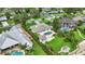 Aerial view shows well maintained houses with access to private pools and a waterfront at 7145 Lake Dr, Orlando, FL 32809