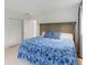 Comfortable bedroom with soft carpet, floral duvet cover, and well-lit with recessed lighting at 7145 Lake Dr, Orlando, FL 32809
