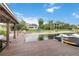 Private waterfront dock with boat lifts and covered slips, perfect for enjoying boating and water sports at 7145 Lake Dr, Orlando, FL 32809