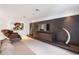 Modern living room features a wall-mounted TV, contemporary decor, and comfortable seating at 7145 Lake Dr, Orlando, FL 32809