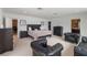 Spacious main bedroom with neutral tones, plush carpeting, and ample seating and closet space at 7145 Lake Dr, Orlando, FL 32809