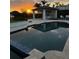 An outdoor oasis with an inviting swimming pool and an open pool house at 7145 Lake Dr, Orlando, FL 32809
