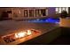 Relaxing backyard with a beautiful pool and outdoor fire pit, perfect for entertaining at 7145 Lake Dr, Orlando, FL 32809