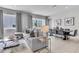 Comfortable living area with contemporary decor, tile flooring, and ample natural light at 7740 Sandy Ridge Dr # 124, Reunion, FL 34747