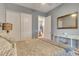 Comfortable bedroom with closet doors and neutral colors at 7918 Esta Ln, Orlando, FL 32827