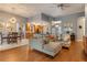 Spacious living room featuring an open floor plan with modern decor and recessed lighting at 7918 Esta Ln, Orlando, FL 32827