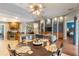 Spacious open floor plan featuring the kitchen, dining, and living room and access to the main bedroom at 7918 Esta Ln, Orlando, FL 32827