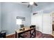 Bright home office with hardwood floors, ceiling fan, and closet space at 831 Royalwood Ln, Oviedo, FL 32765