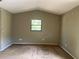 Bedroom featuring carpet flooring and a window at 1050 Reading Ct, Winter Park, FL 32792