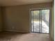 Bedroom with carpet flooring and sliding glass doors to the outdoor patio at 1050 Reading Ct, Winter Park, FL 32792