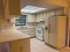 Kitchen featuring neutral countertops and appliances at 1050 Reading Ct, Winter Park, FL 32792