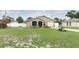 Charming single-story home with a well-manicured lawn and tasteful landscaping at 1078 Aaron Dr, Deltona, FL 32725