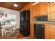Bright kitchen with stainless steel appliances, wood cabinets, and breakfast area at 1078 Aaron Dr, Deltona, FL 32725
