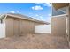 Spacious brick patio enclosed by a white fence, offering privacy and outdoor enjoyment at 11054 Hanlon Terrace Aly, Winter Garden, FL 34787