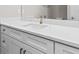 Bathroom featuring white vanity with stone countertop and modern faucet at 136 N James Pl, Groveland, FL 34736
