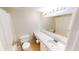 Bathroom featuring a mirror above the sink, toilet, and shower at 145 Oyster Bay Cir # 200, Altamonte Springs, FL 32701
