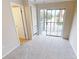 Cozy bedroom with sliding glass door to private balcony at 145 Oyster Bay Cir # 200, Altamonte Springs, FL 32701