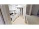 Functional kitchen with full appliances, tile floors, and in-unit laundry area at 145 Oyster Bay Cir # 200, Altamonte Springs, FL 32701