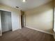 Bedroom with plush carpet, and closet at 14508 Cedar Branch Way, Orlando, FL 32824