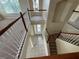 Open foyer showcasing tile flooring and a staircase with wood railings at 14508 Cedar Branch Way, Orlando, FL 32824