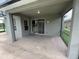 Covered patio provides an outdoor space for relaxing or entertaining guests at 14508 Cedar Branch Way, Orlando, FL 32824