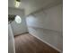 Walk-in closet with carpet and several wired rack shelves at 14508 Cedar Branch Way, Orlando, FL 32824