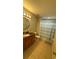 Well-lit bathroom featuring a vanity with granite counters and a shower with a curtain at 16631 Lazy Breeze Loop, Clermont, FL 34714