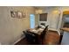 Well lit dining room featuring modern decor, a decorative light fixture and seating for six at 16631 Lazy Breeze Loop, Clermont, FL 34714