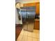 Kitchen featuring stainless steel refrigerator and granite counters at 16631 Lazy Breeze Loop, Clermont, FL 34714