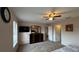 Main bedroom featuring carpet, ceiling fan, dresser, and walk in closet at 16631 Lazy Breeze Loop, Clermont, FL 34714