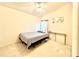 Bedroom with plush carpeting, natural light, bed frame with mattress and simple decor at 1672 Canoe Creek Rd, Oviedo, FL 32766