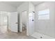 Bathroom with tiled shower, toilet, and modern fixtures offering a clean and stylish design at 178 Marion Oaks Ln, Ocala, FL 34473