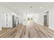 Spacious open-concept layout features hardwood floors, modern stainless appliances, and ample living space at 178 Marion Oaks Ln, Ocala, FL 34473